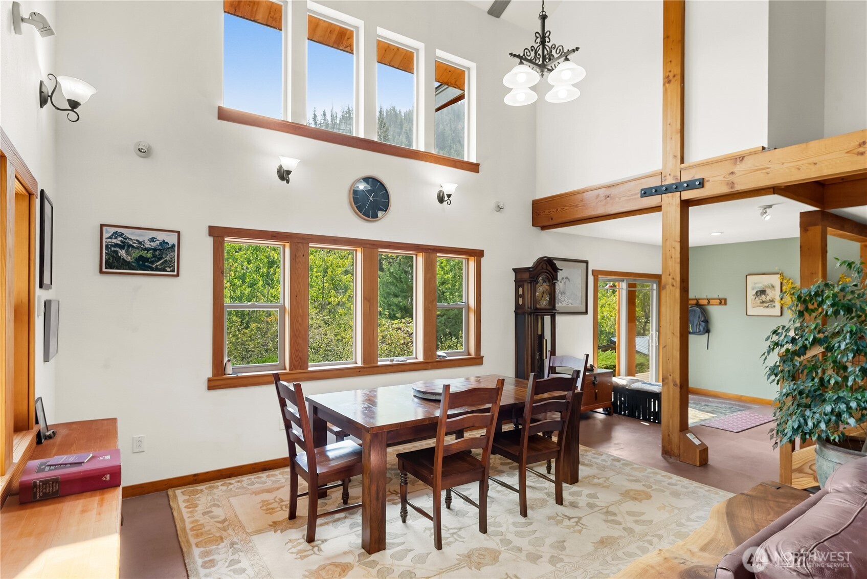 96 Alder Creek Road Twisp, WA 98856 - Photo 14 of 40 a view of a dining room with furniture window and wooden floor