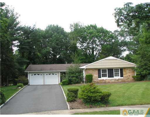 5 Chandler Road Somerset, NJ 08873 - Photo 1 of 10 a front view of house with yard and green space