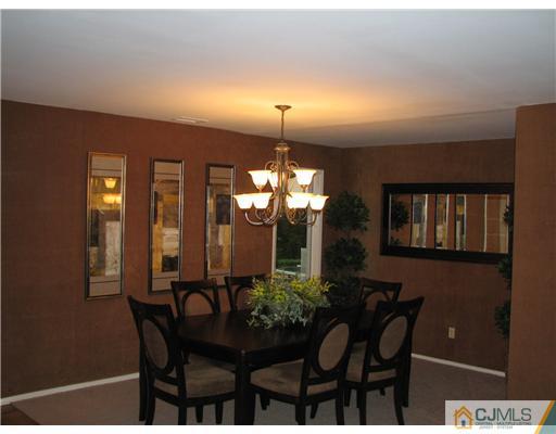 5 Chandler Road Somerset, NJ 08873 - Photo 3 of 10 a view of a dining room with furniture and chandelier