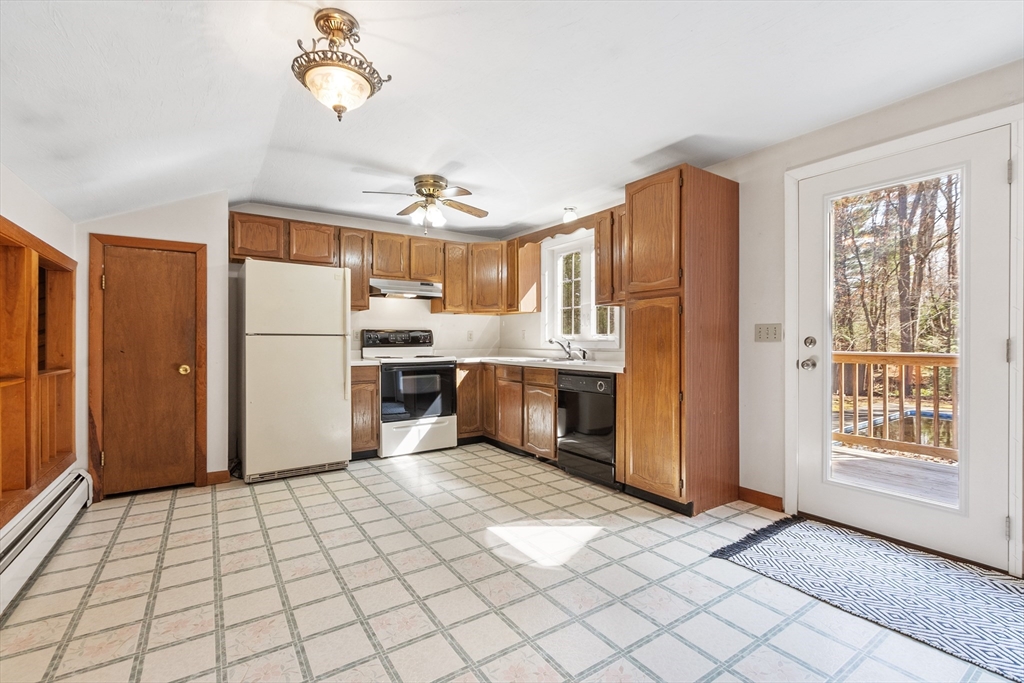 198 Lunenburg Road Townsend, MA 01474 - Photo 27 of 39 a kitchen with stainless steel appliances granite countertop a refrigerator and a sink