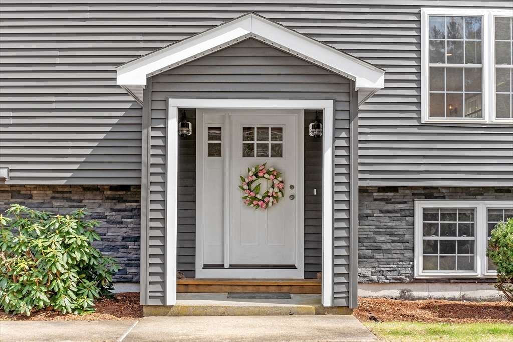 198 Lunenburg Road Townsend, MA 01474 - Photo 5 of 39 a front view of a house with a plants