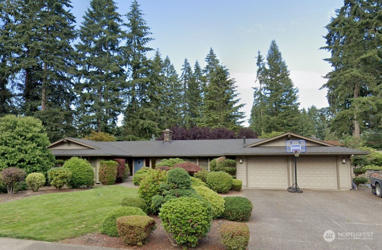 14112 148th Place Southeast Renton, WA 98059 - Photo 1 of 1 a view of a house with a yard