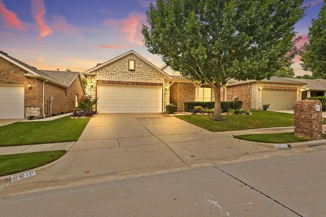a view of garage and yard