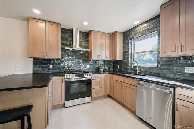 a view of a kitchen from the hallway