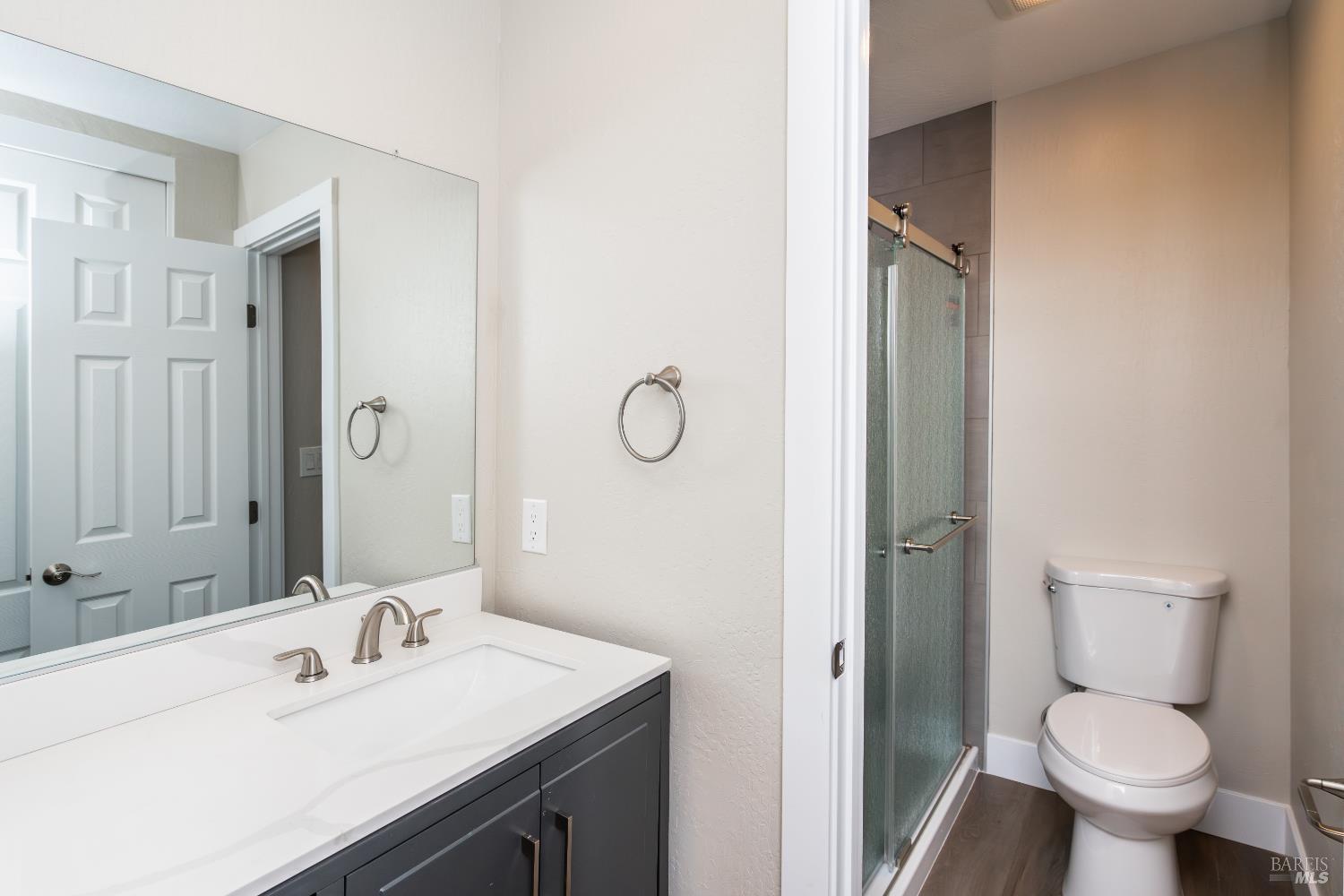 37 Pacheco Street San Rafael, CA 94901 - Photo 12 of 24 a bathroom with a sink toilet and shower