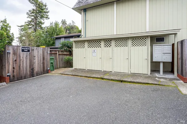 a room with a clock and cabinets
