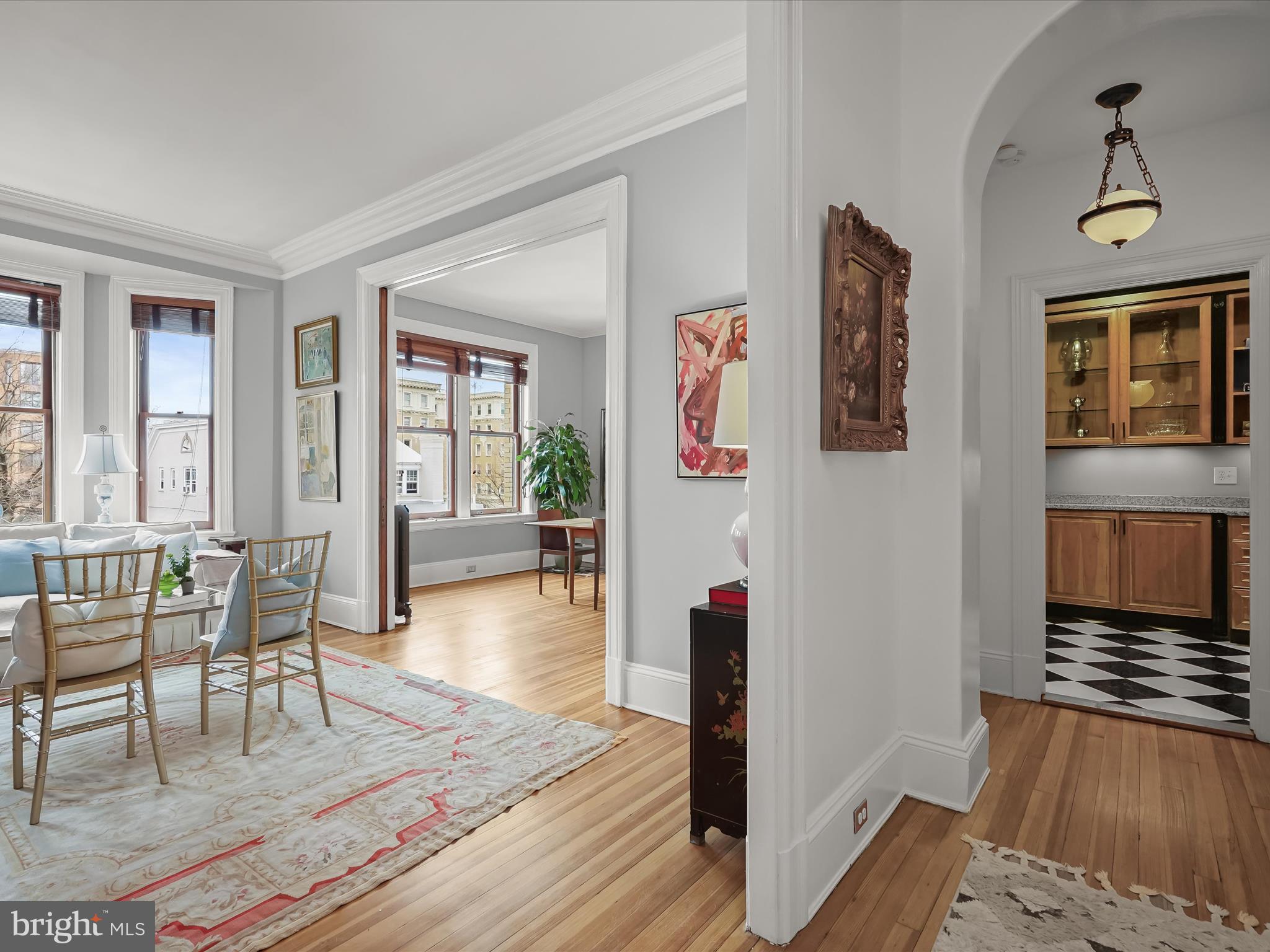 2220 20th Street Northwest, Unit 46 Washington, DC 20009 - Photo 12 of 27 a living room with furniture and wooden floor