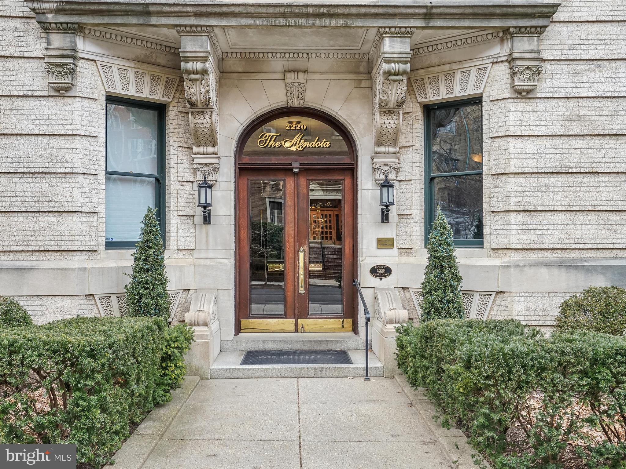 2220 20th Street Northwest, Unit 46 Washington, DC 20009 - Photo 26 of 27 a front view of a house with garden