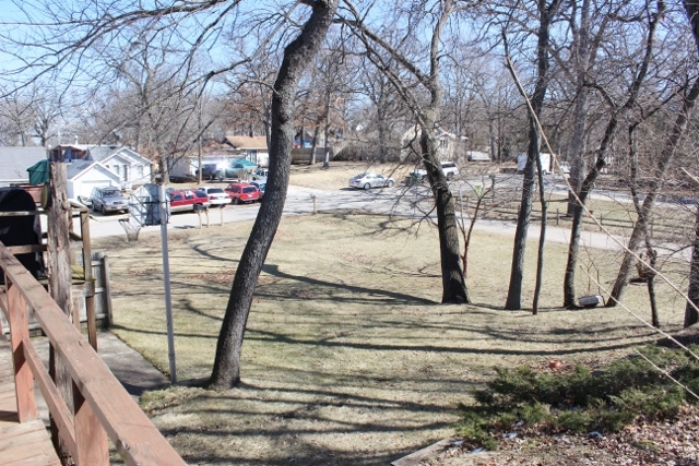 28621 Valley Road Ingleside, IL 60041 - Photo 24 of 24 a view of a yard with wooden fence