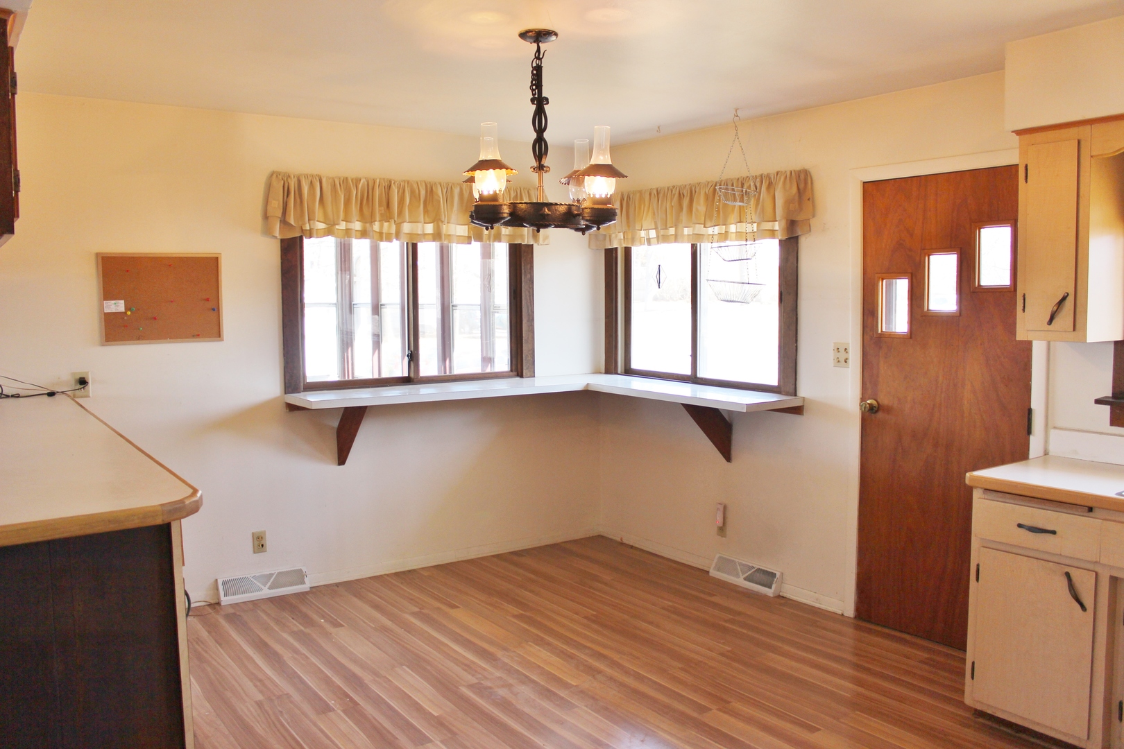 28621 Valley Road Ingleside, IL 60041 - Photo 8 of 24 a view of empty room with wooden floor and fan