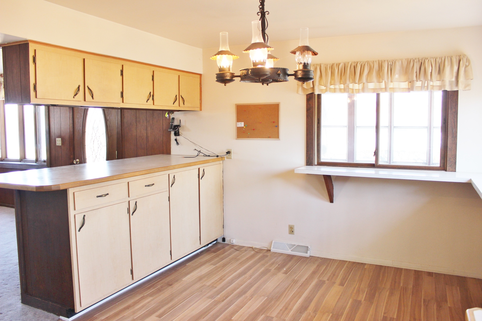 28621 Valley Road Ingleside, IL 60041 - Photo 9 of 24 a view of kitchen with granite countertop cabinets and wooden floor