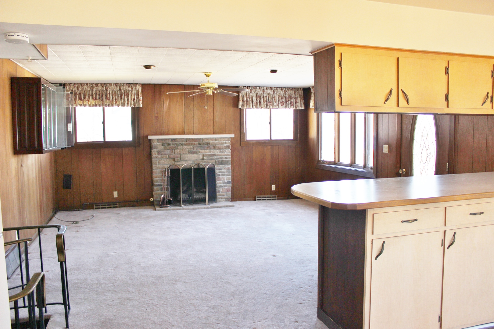 28621 Valley Road Ingleside, IL 60041 - Photo 10 of 24 a view of kitchen with furniture and fireplace