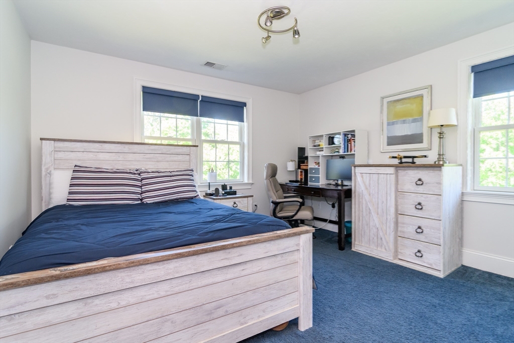 2 Hunters Lane Natick, MA 01760 - Photo 25 of 40 a bedroom with a bed and a window