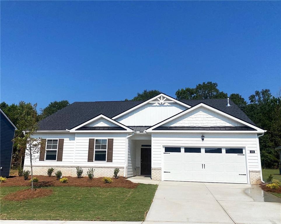 200 Defilippe Drive Statham, GA 30666 - Photo 1 of 60 a front view of a house with a yard