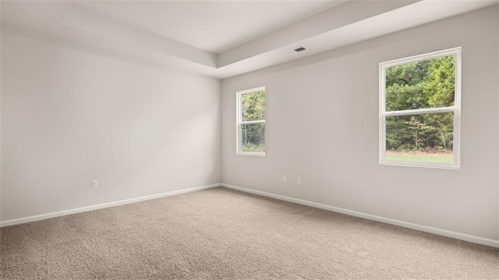 200 Defilippe Drive Statham, GA 30666 - Photo 17 of 60 an empty room with a window