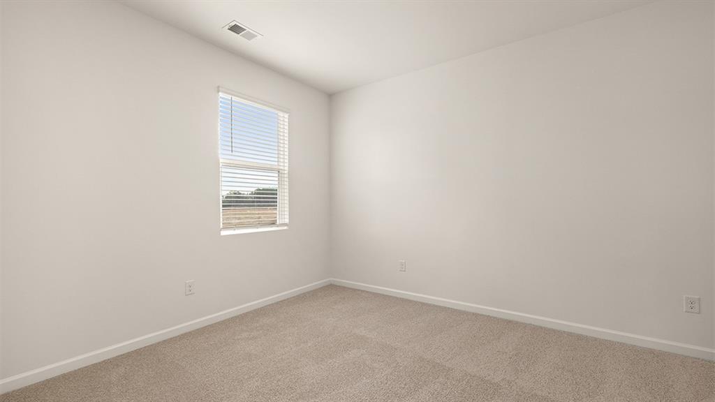200 Defilippe Drive Statham, GA 30666 - Photo 28 of 60 an empty room with a window