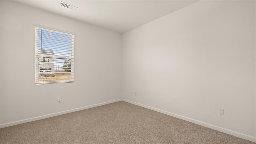 200 Defilippe Drive Statham, GA 30666 - Photo 30 of 60 an empty room with a window