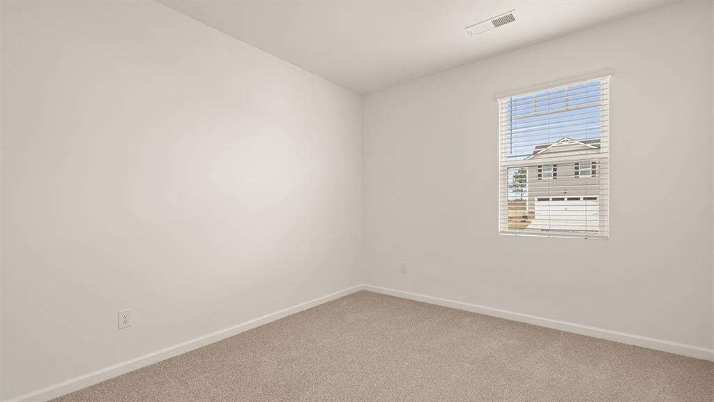 200 Defilippe Drive Statham, GA 30666 - Photo 32 of 60 an empty room with a window