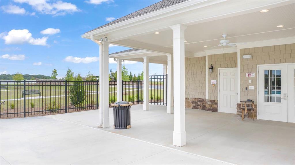 200 Defilippe Drive Statham, GA 30666 - Photo 45 of 60 a view of a house with a floor to ceiling window next to a yard
