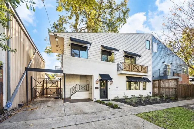 a front view of a house with a garage