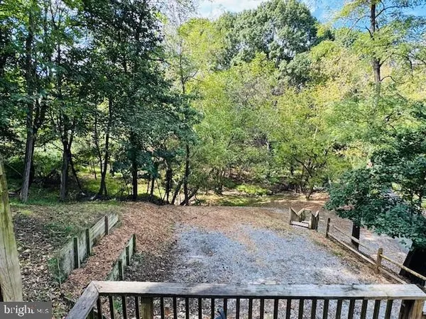 a view of backyard with green space