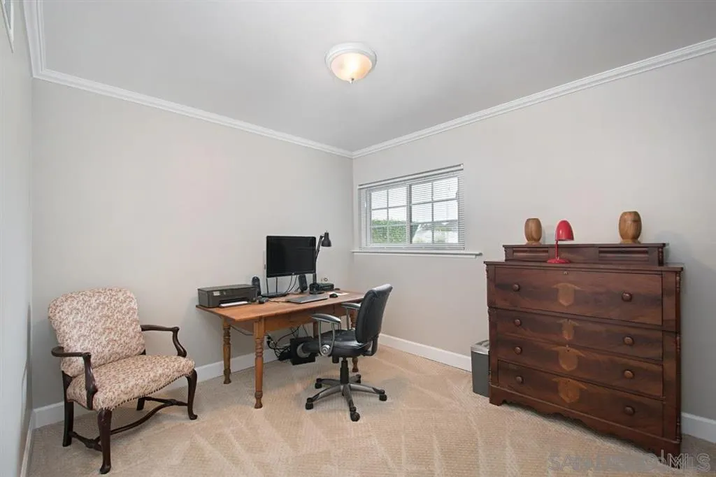 2022 Sheridan Road Encinitas, CA 92024 - Photo 13 of 25 a view of a workspace with furniture and a window