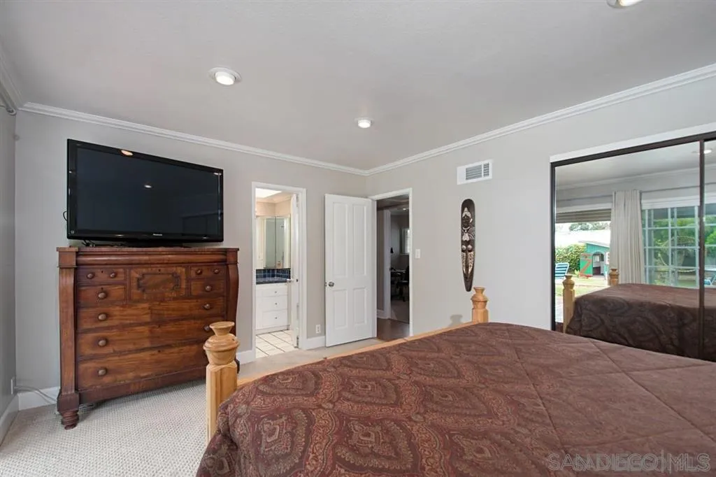 2022 Sheridan Road Encinitas, CA 92024 - Photo 10 of 25 a bedroom with a bed and furniture