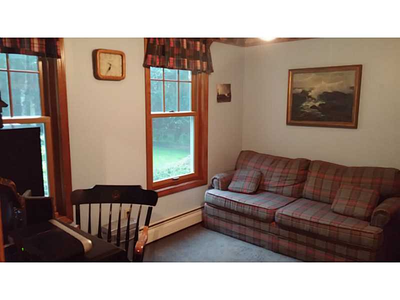 55 Falcon Ridge Drive Exeter, RI 02822 - Photo 18 of 25 Den/Family/Great Room. 1st floor den can be used as a bedroom. It has a closet