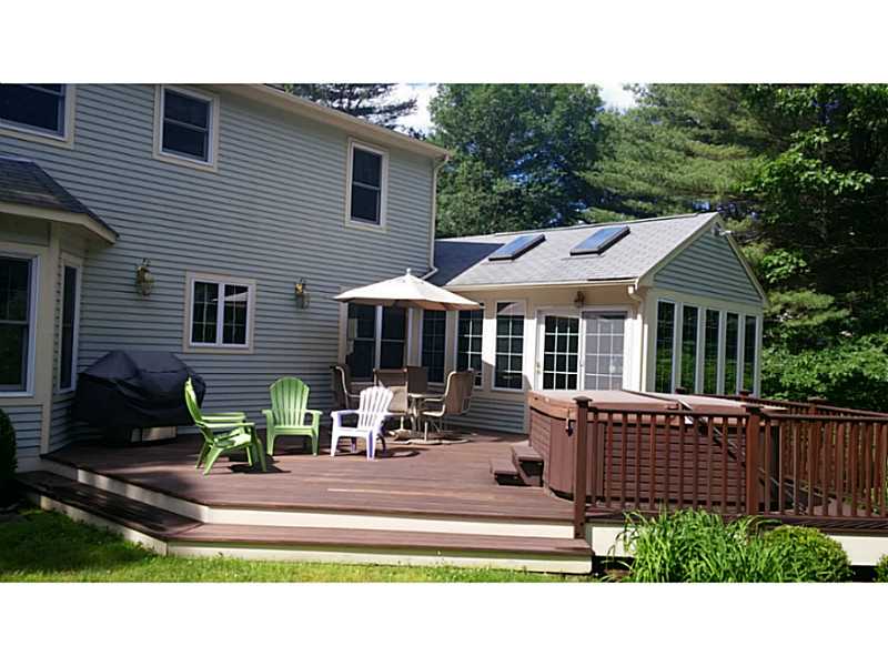 55 Falcon Ridge Drive Exeter, RI 02822 - Photo 5 of 25 Patio/Deck. This back mahogany deck is accessed from the sunroom. It has a 7 person hot tub!