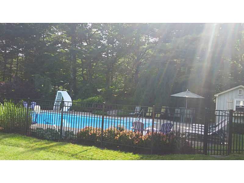 55 Falcon Ridge Drive Exeter, RI 02822 - Photo 7 of 25 Swimming Pool/Hot Tub/Sauna. Awesome inground pool is fenced in with a functional cabana