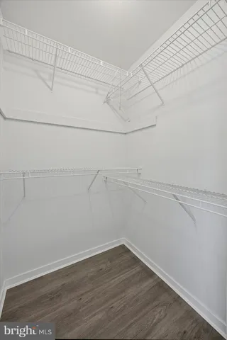 a view of a room with racks on the wall