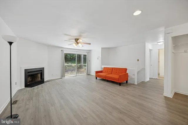 a room with a bed and a fireplace