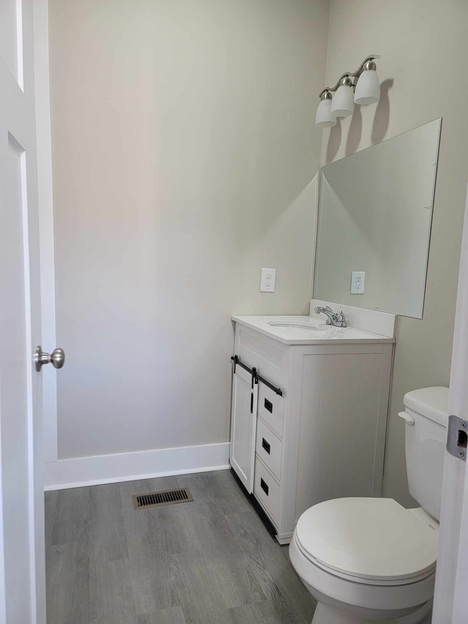 773 Shady Rest Road McMinnville, TN 37110 - Photo 12 of 14 a bathroom with a sink a toilet and vanity