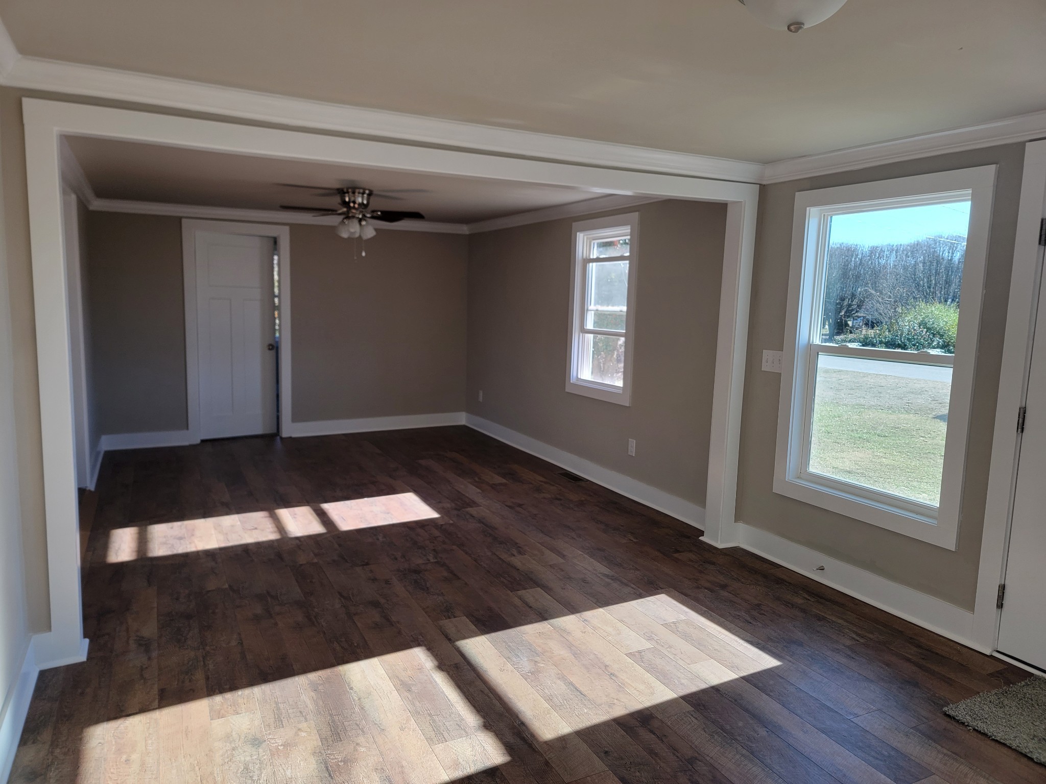 773 Shady Rest Road McMinnville, TN 37110 - Photo 3 of 14 wooden floor in an empty room with a window