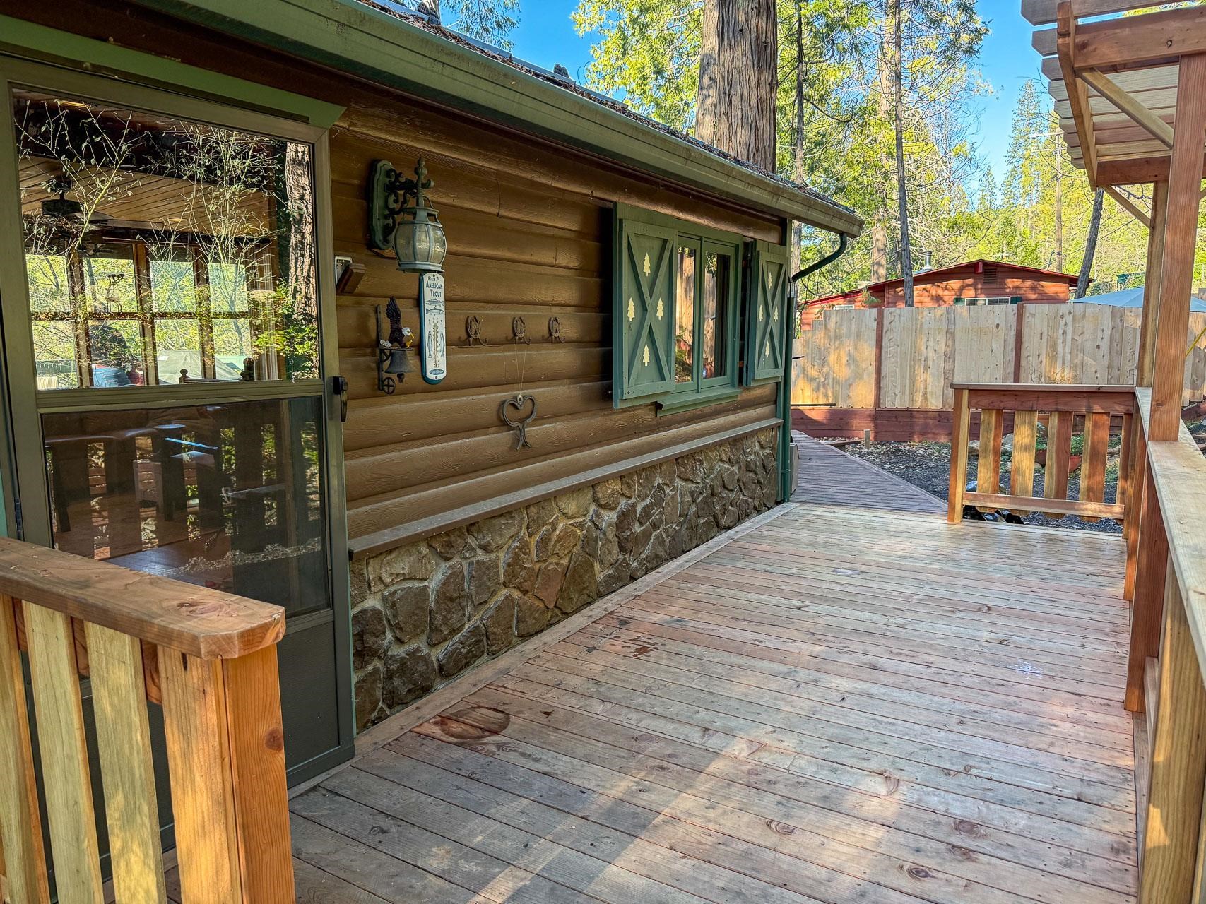 21819 Confidence Road Twain Harte, CA 95383 - Photo 2 of 15 a view of living room kitchen and deck