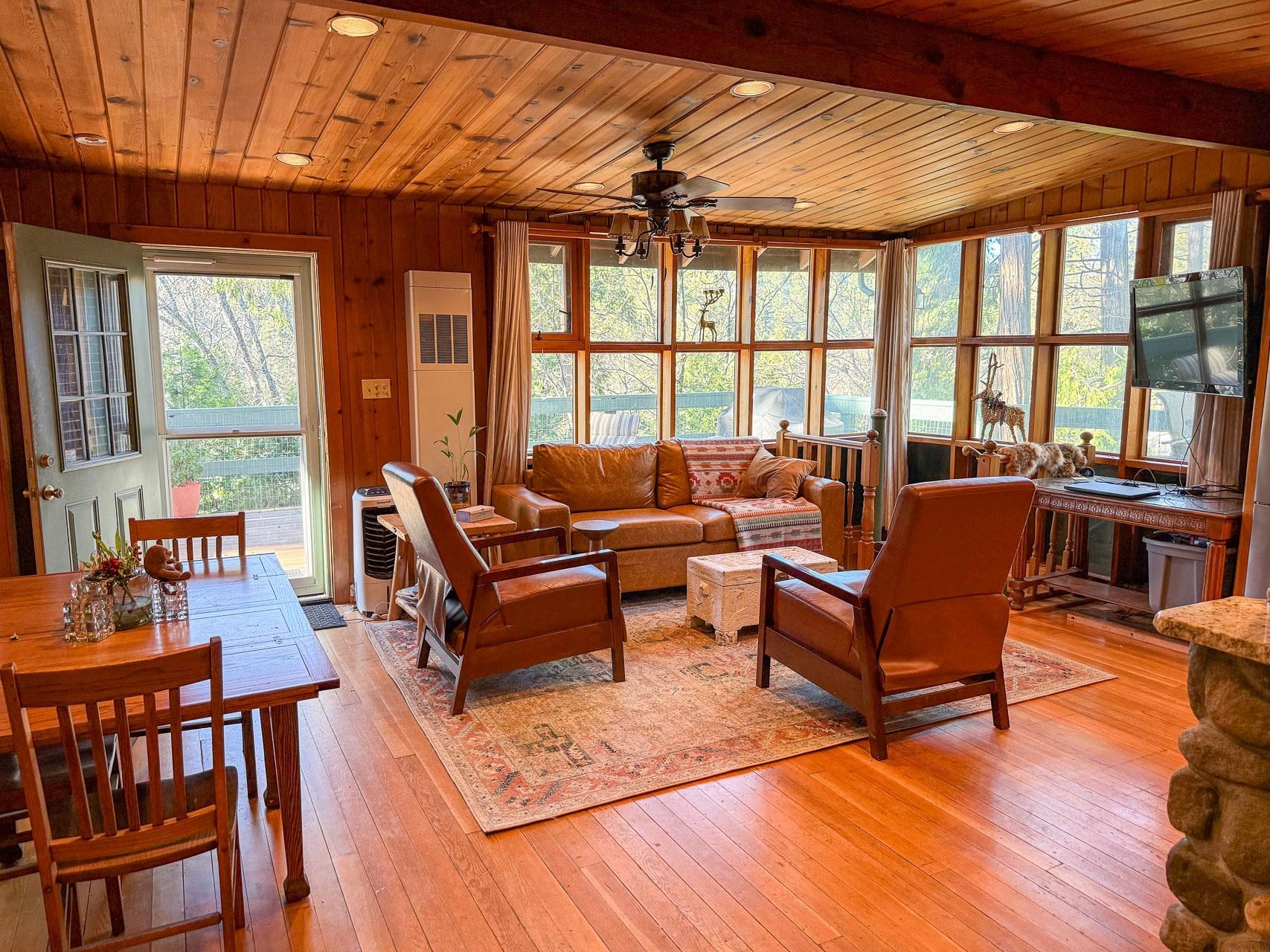 21819 Confidence Road Twain Harte, CA 95383 - Photo 4 of 15 a living room with furniture and a large window