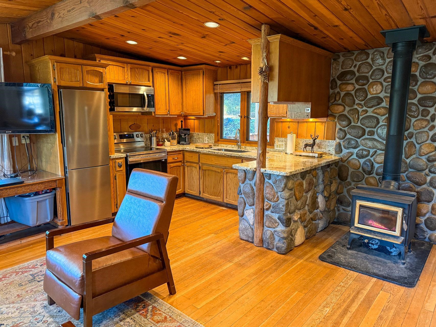 21819 Confidence Road Twain Harte, CA 95383 - Photo 7 of 15 a view of kitchen with furniture and stainless steel appliances