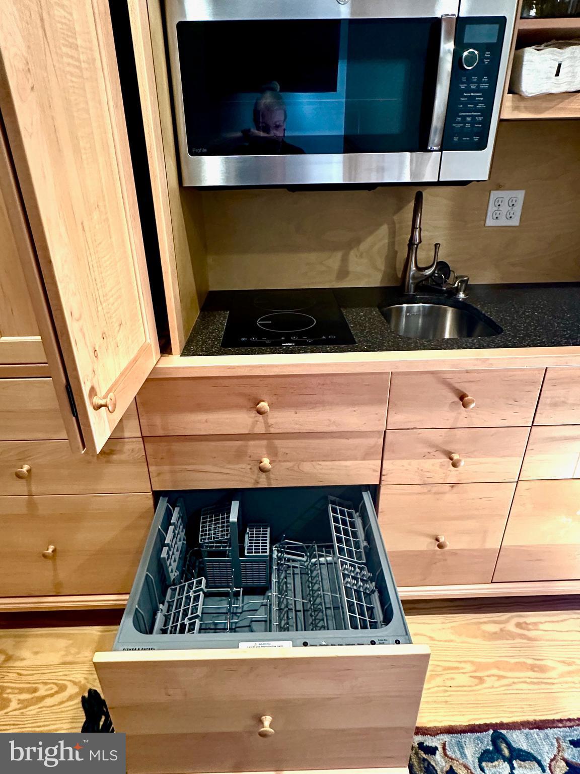 23629 Willow Pond Road Denton, MD 21629 - Photo 23 of 32 Opening the cabinet to all the necessaries. Micro.