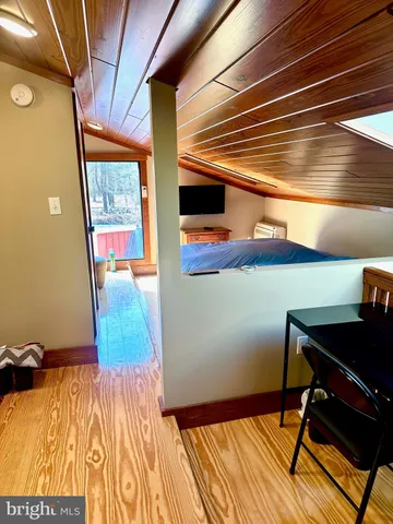 a view of a room with rack on the wall