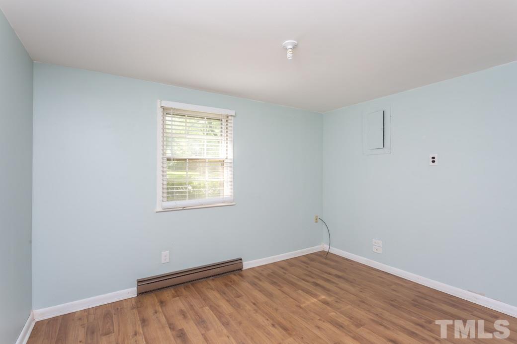 2108 Balboa Road Raleigh, NC 27603 - Photo 13 of 23 The downstairs bedroom could also be an office space.