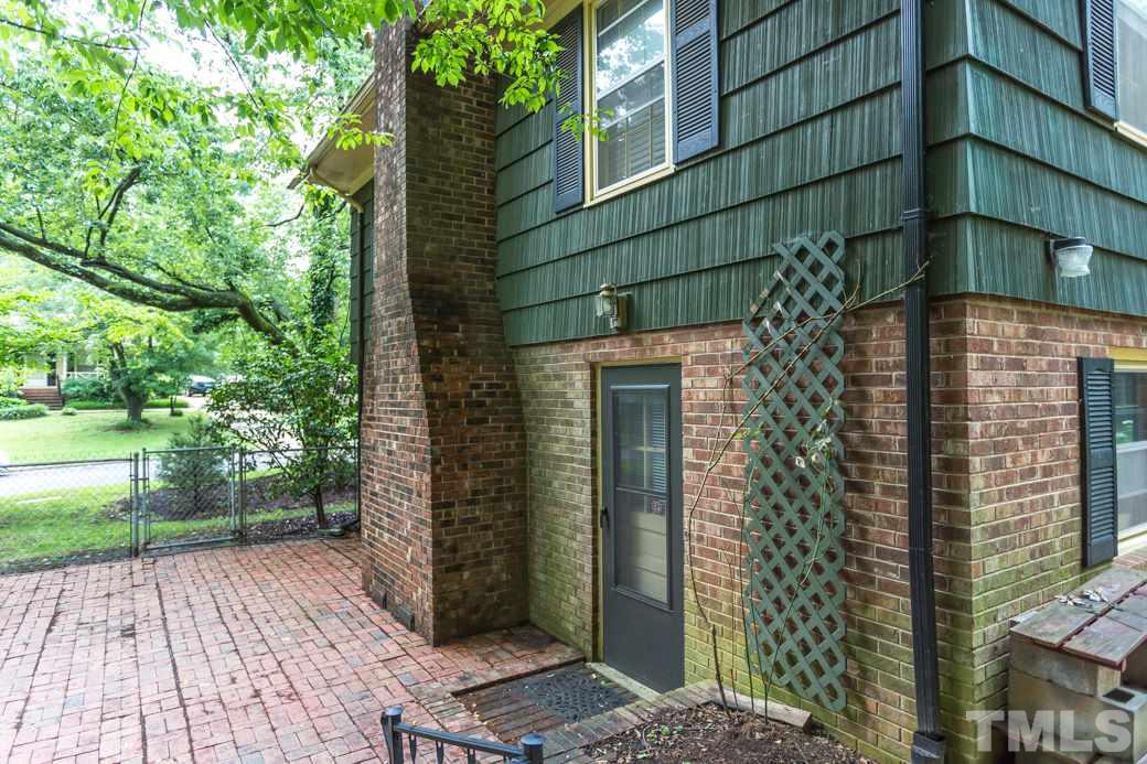 2108 Balboa Road Raleigh, NC 27603 - Photo 20 of 23 The den is accessible though the side patio.