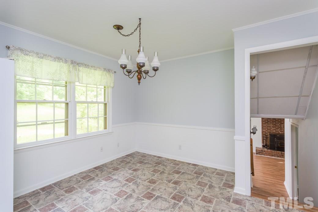 2108 Balboa Road Raleigh, NC 27603 - Photo 10 of 23 Enjoy the beautiful view of the backyard as you dine!