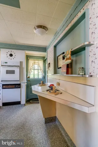 a room with furniture and window