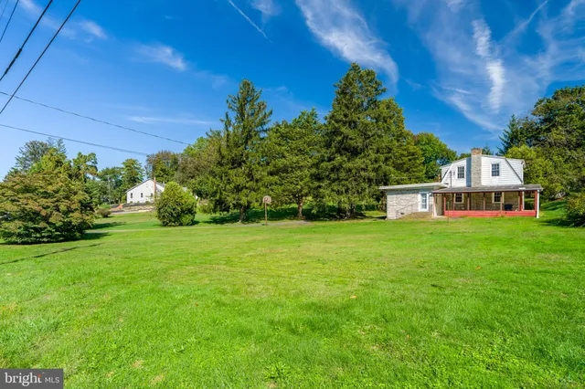 a view of a house with a garden