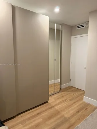 a workspace with furniture and window