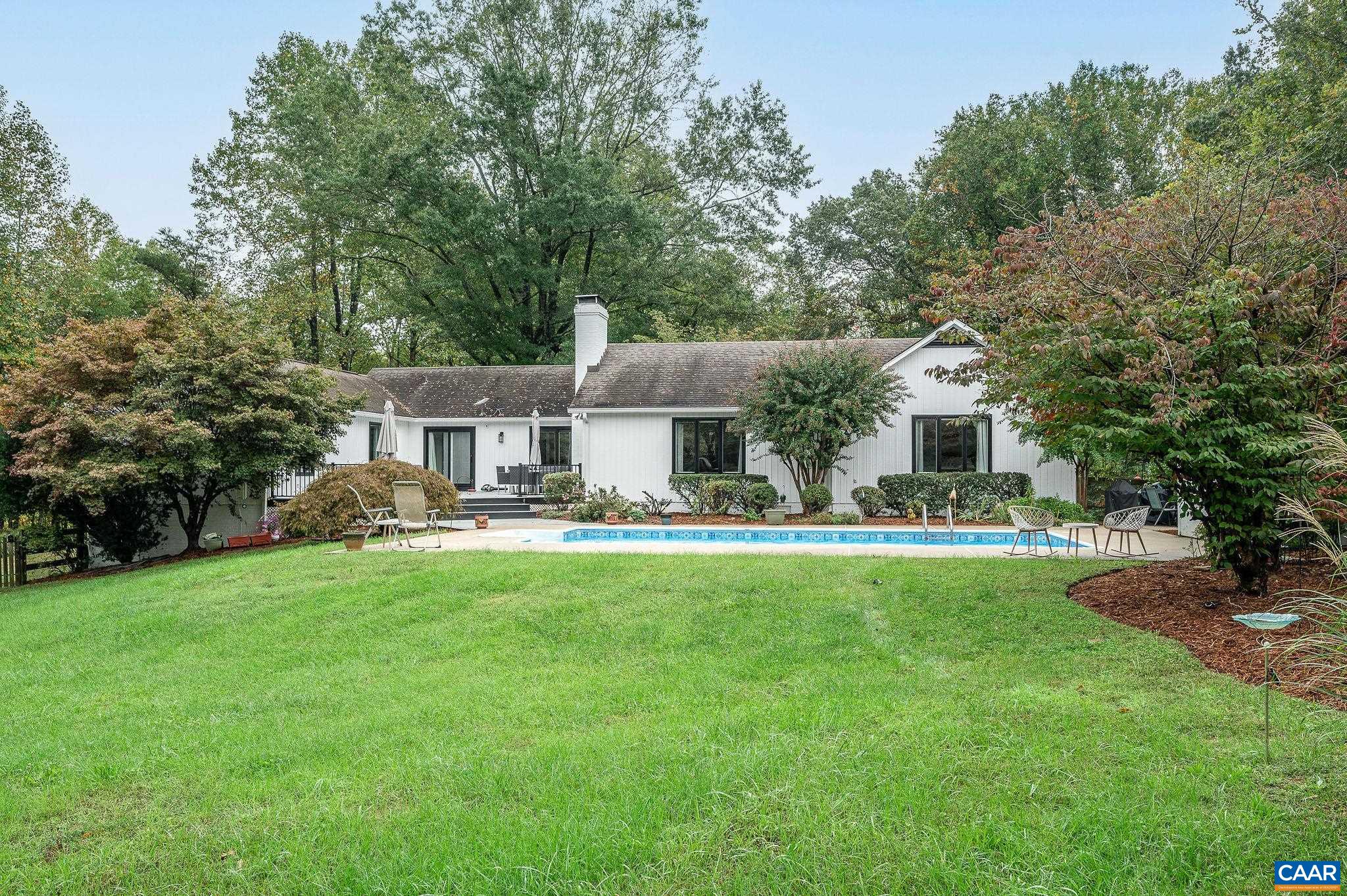 2795 Pea Ridge Road Charlottesville, VA 22901 - Photo 3 of 54 a front view of a house with yard patio and green space