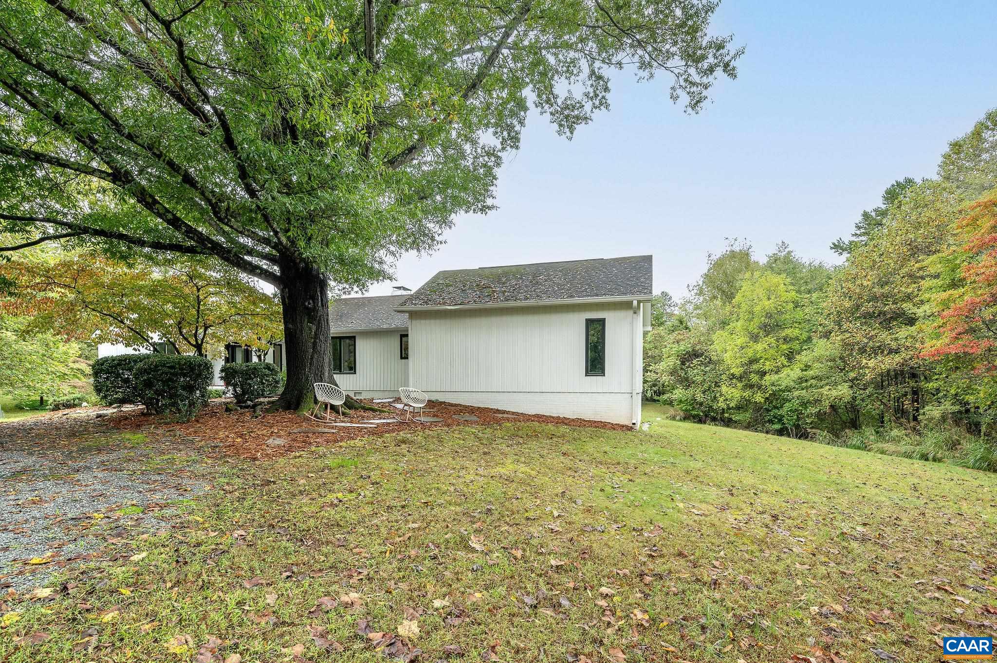 2795 Pea Ridge Road Charlottesville, VA 22901 - Photo 54 of 54 a house with a tree in front of it