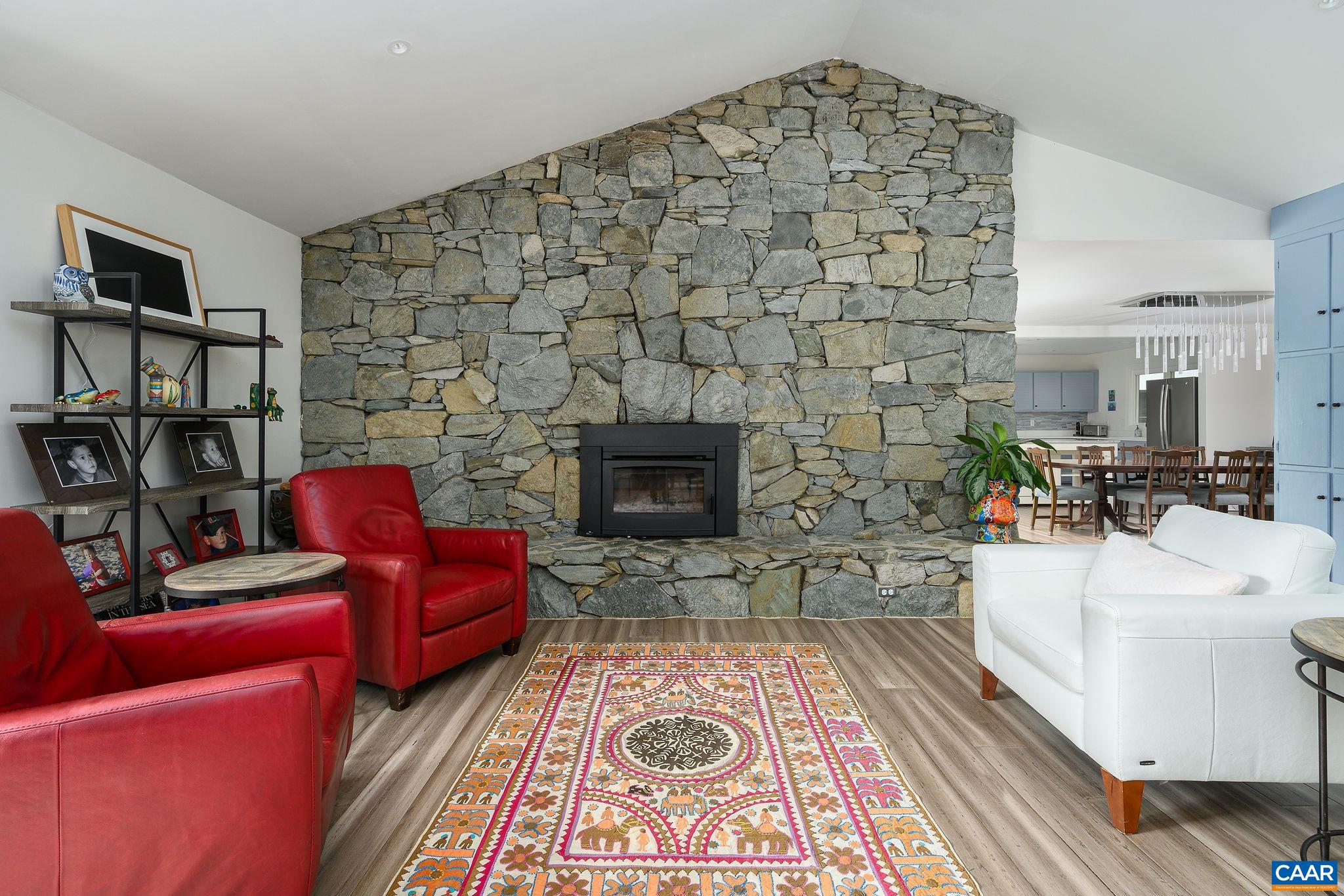 2795 Pea Ridge Road Charlottesville, VA 22901 - Photo 7 of 54 a living room with furniture and a fireplace