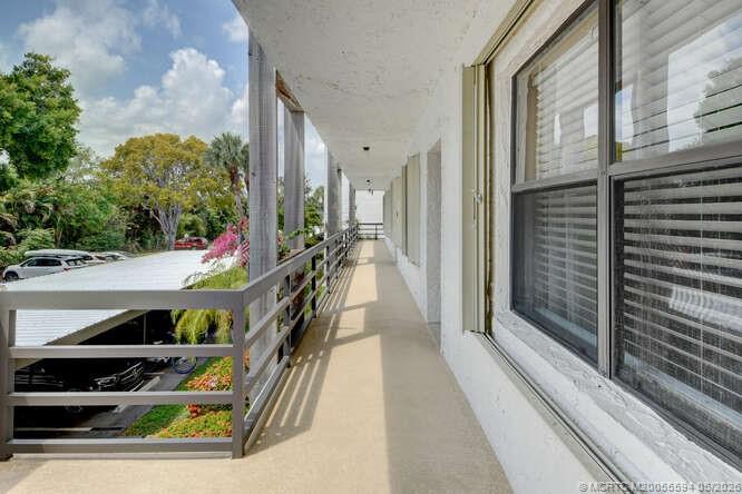 1950 Southwest Palm City Road, Unit 3209 Stuart, FL 34994 - Photo 28 of 64 Exterior catwalk entrance.