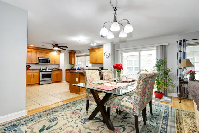 a dining room filled counter top space and a dining table